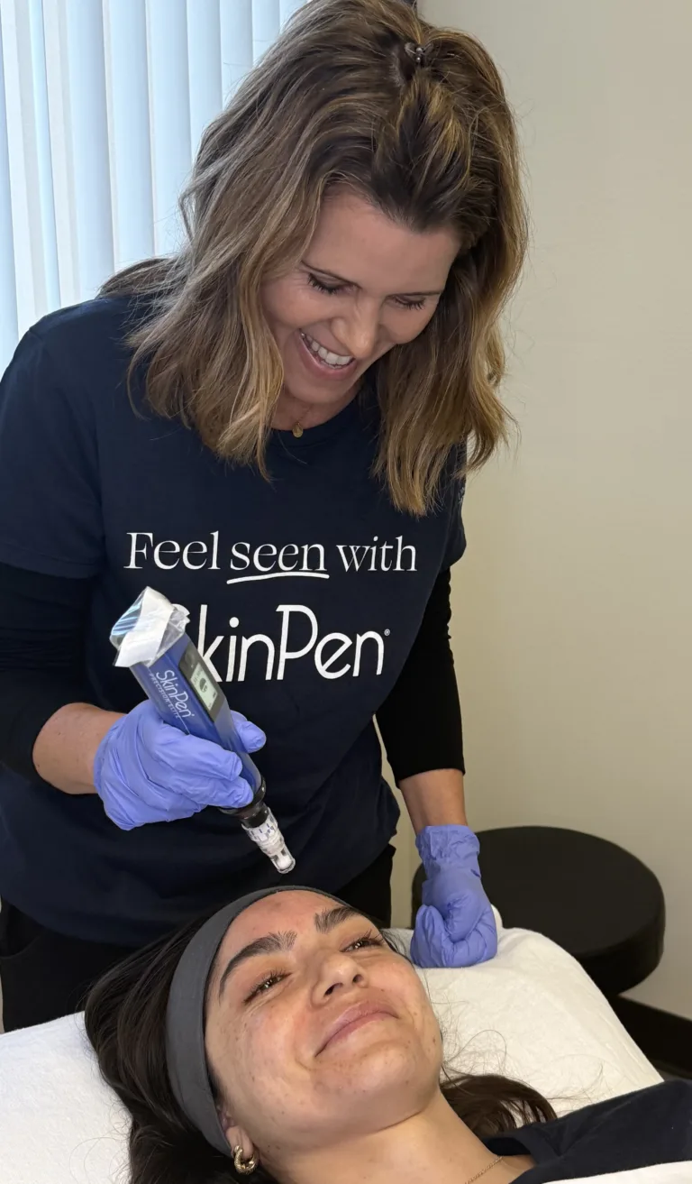 Ann Chade, RB with patient treating skin SkinPen®