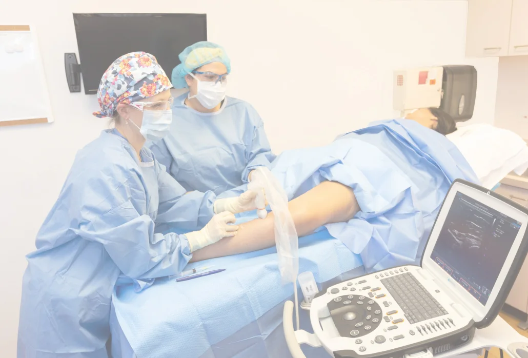 doctor using ultrasound in vein treatment